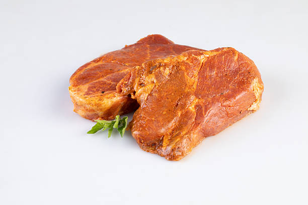 Pork Steak with Herbs isolated nature background with clipping path