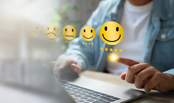 istock Experience excellent customer service, User give five star rating on online application, Positive feedback, Happy, Smiley face icon. Customer Reviews in Digital Survey, Satisfaction. 2222908622