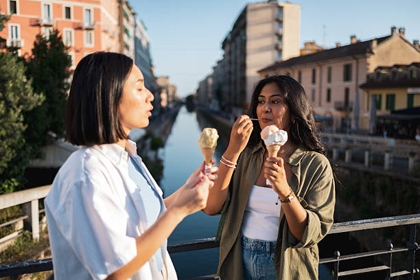 istock Enjoying ice cream by the canal in milan 2222911312