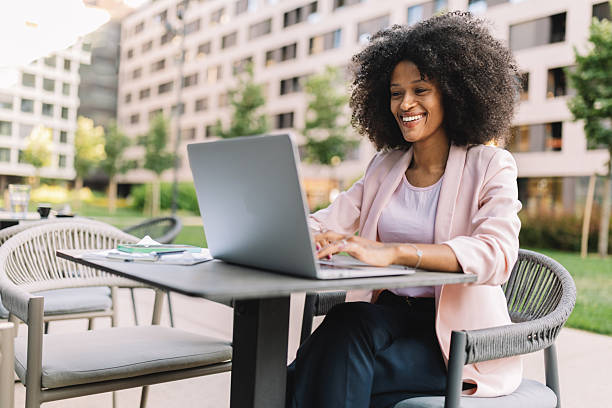 istock Woman focused on her laptop while enjoying nature 2222919830