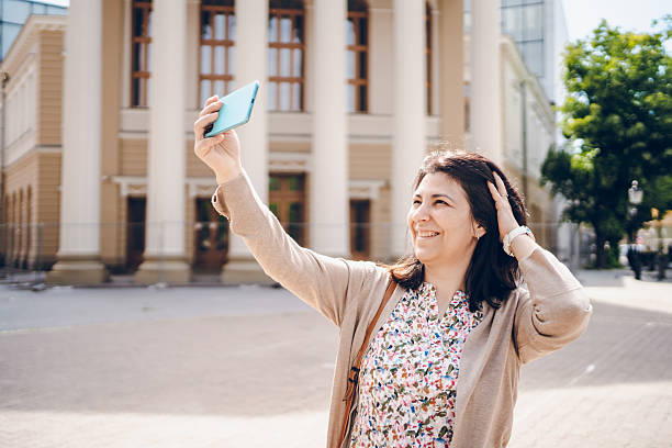 istock Woman using phone and enjoy in walking 2222921159