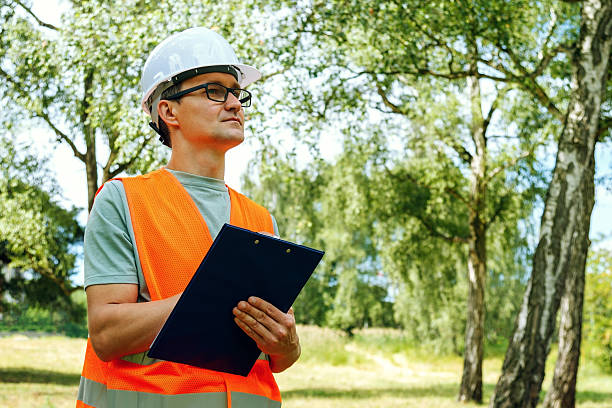 istock Forester worker. Engineer ecologist man in the forest marks of the ecological situation. 2222922949