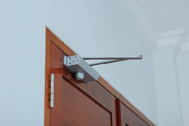 istock Close up of an automatic door closer 2222923935