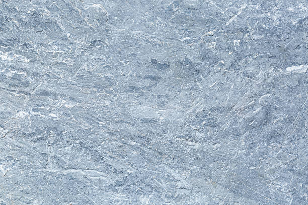 istock Macro close-up of stone texture,White abstract background with detailed stone texture,Abstract marble texture background for design. 2222924138