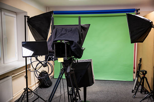 istock Indoor Studio Setup with Green Screen and Professional Equipment 2222924439