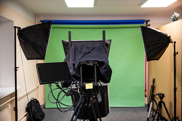 istock Professional Studio Setup with Green Screen and Lighting Equipment 2222924440