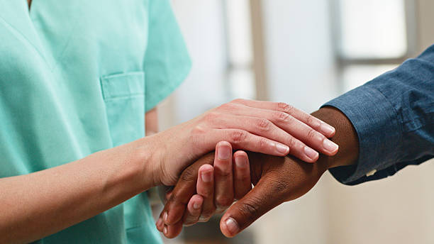 istock Friendly Interaction Between a Nurse and Patient Emphasizing Compassion and Understanding in Healthcare 2222925291