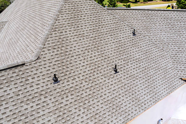 istock Roofing installation showcased on large residential building under clear blue sky during works day 2222925928