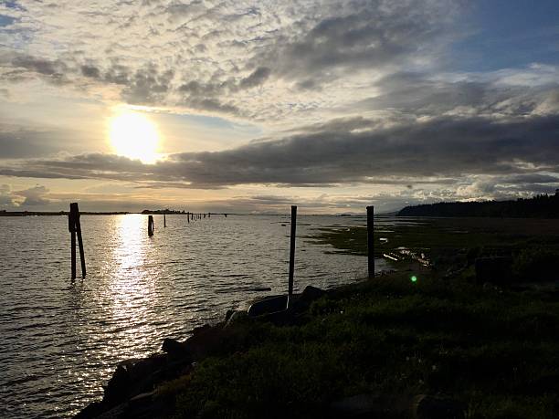 istock Sunset Over Calm Coastal Waters 2222927415