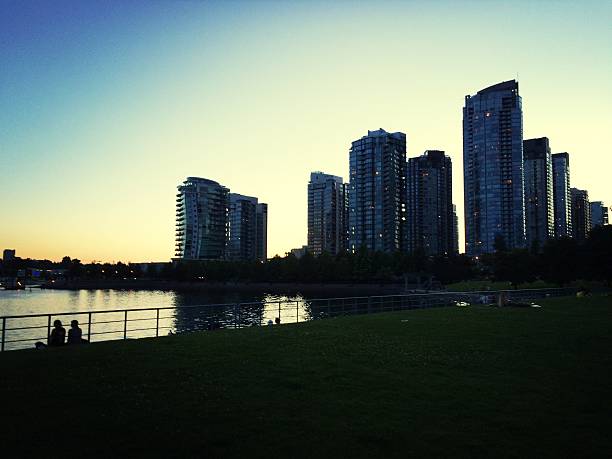 istock Modern City Skyline at Dusk with Waterfront View 2222927429