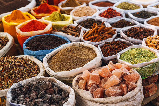 istock Vivid Array of Spices and Ingredients at a Bustling Market 2222928319
