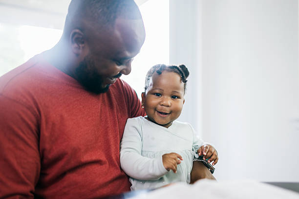 istock Father Reading Bible With His Daughter 2222930185