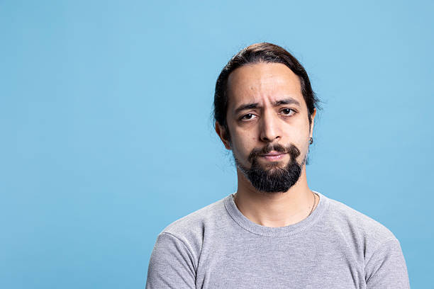istock Serious person doing disappointing facial expressions on camera 2222932154