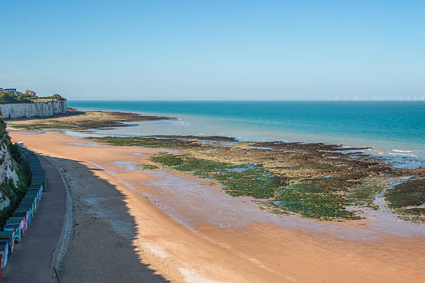 istock Stone Bay beach in Broadstairs, England, featuring white cliffs and a calm sea with a sandy beach 2222932299