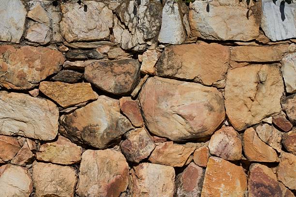 self-built wall made of natural sandstone as a biotope for insects