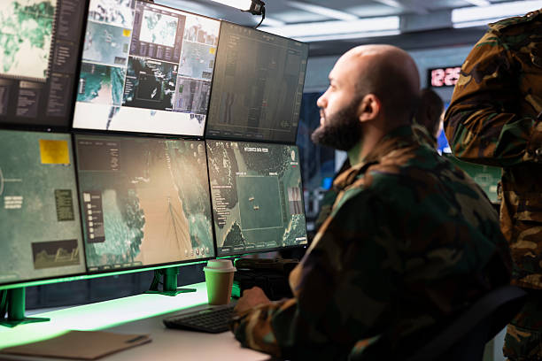 istock Military agent working in control room, analyzing aerial reconnaissance data 2222934616