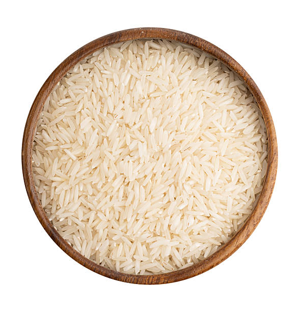 istock Parboiled rice macro basmati in a wooden boul 2222935122