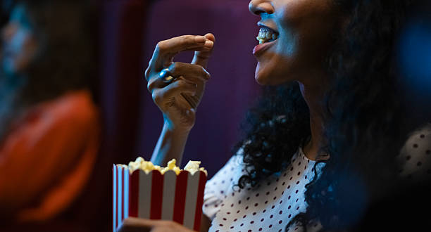 istock Lady with Popcorn: Movie Theater Enthusiast 2222935536