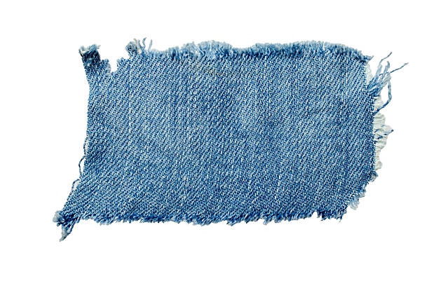 istock jeans. a frayed and torn piece of denim rag 2222939905