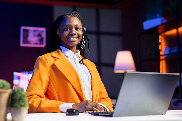 istock Portrait of smiling student at home doing homework 2222944704