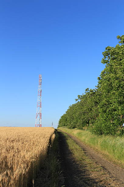 istock A dirt road with a tower in the background 2222944885