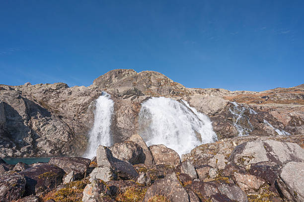 The view from the hiking trail in Joutunheimen National Park in Norway on a sunny day in autumn (October). The image was captured with a full frame DSLR camera with a prime wide angle lens at low ISO resulting in a large, clean file. The image is part of a large series of photographs of Jotunheimen at various seasons.