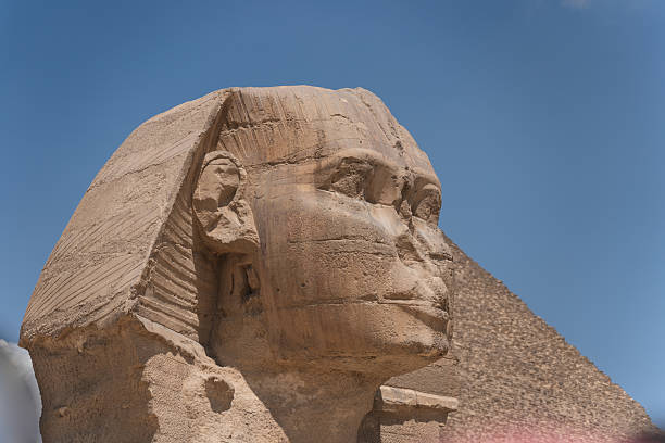 Great Sphinx of Giza, a limestone statue of a mythical creature with a lion's body and a human head), Giza Plateau, West Bank of the Nile, Giza, Egypt