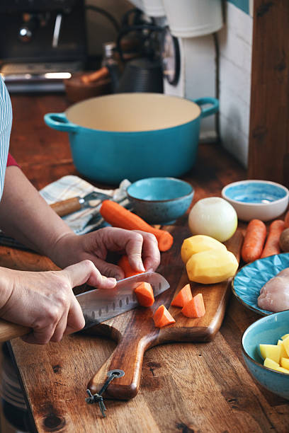 istock Preparing Japanese Katsu Curry with Crispy Chicken and Vegetables 2222951600
