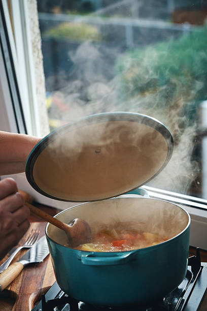 istock Preparing Japanese Katsu Curry with Crispy Chicken and Vegetables 2222951830