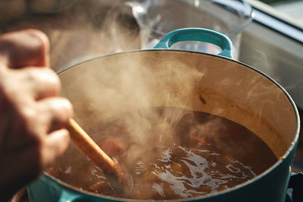 istock Preparing Japanese Katsu Curry with Crispy Chicken and Vegetables 2222951869