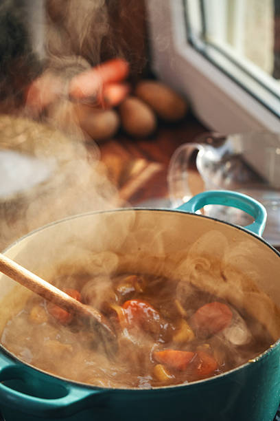 istock Preparing Japanese Katsu Curry with Crispy Chicken and Vegetables 2222951872