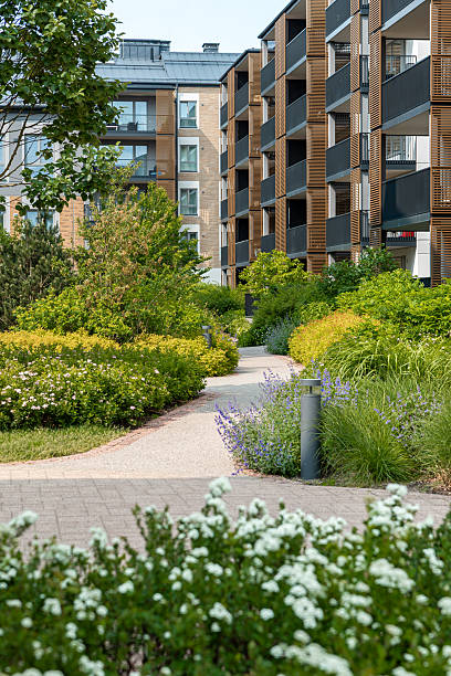 istock Modern Residential Complex with Pathway and Landscaped Garden 2222958602
