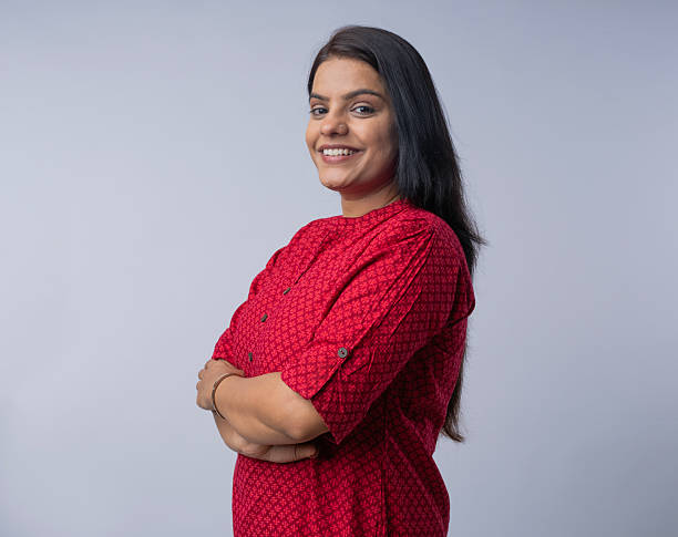 istock Happy woman against white background 2222960406