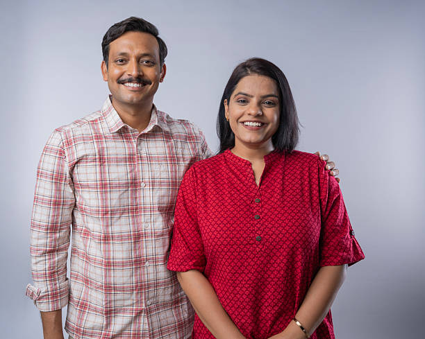 istock Happy mid adult couple posing on white background 2222960872