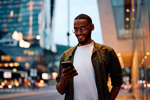 istock Young businessman using smartphone in the city at night 2222963915
