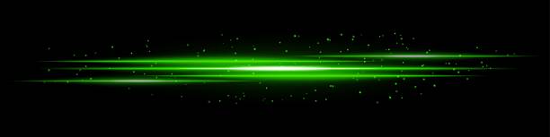 istock Glowing green light streaks with scattered particles on a dark background. Futuristic energy flow, laser effect, neon illumination, and digital speed motion concept. 2222964528