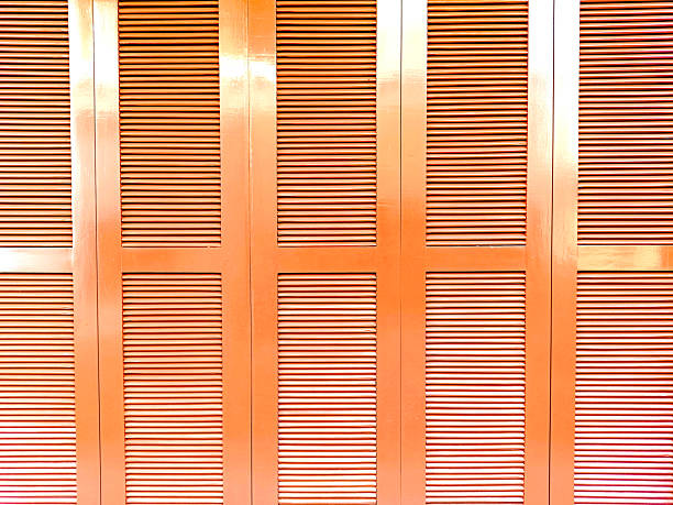istock A series of wooden garage doors or panel doors with a jalousie design. 2222964932