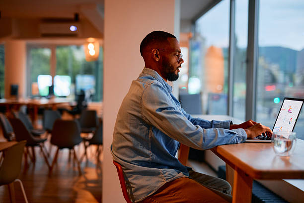 istock Focused businessman analyzing charts on laptop in modern office 2222965096