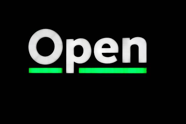 Bright Open sign for business on black background
