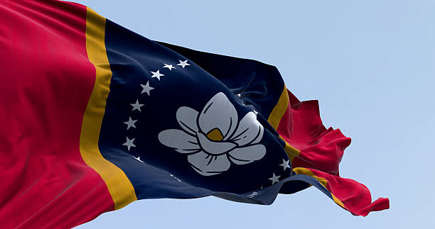 istock Mississippi state flag waving on a clear day 2222967350