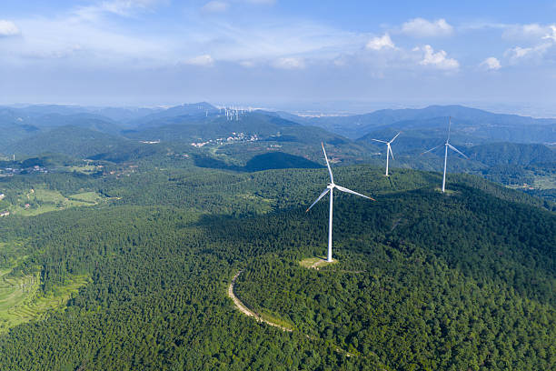 istock Green power plants, wind turbines on forest mountaintops 2222974327