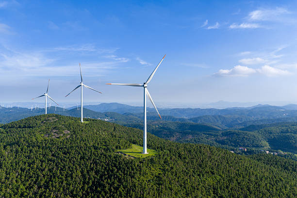 istock Green power plants, wind turbines on forest mountaintops 2222974385