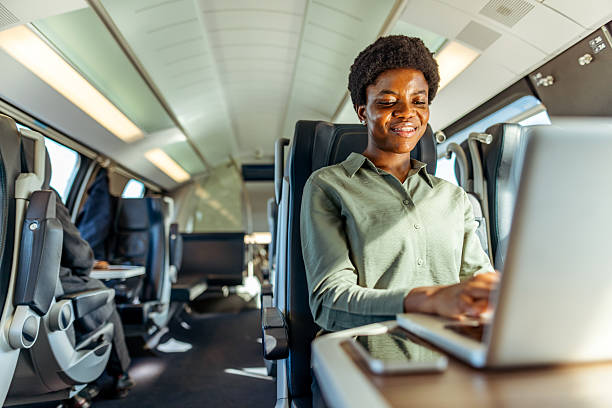 istock Business Woman Working on a Laptop in Comfortable Train Interior 2222983066