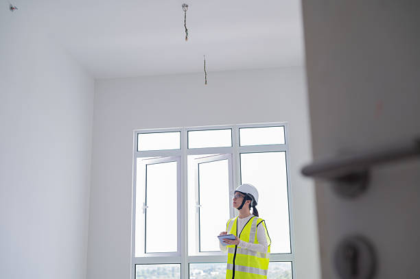 istock Asian Female Chinese inspector inside new building unit checking any defects before handover to client stock photo 2222985516
