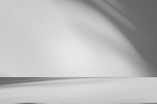 istock Wall interior background, studio and backdrops show products.with shadow from window color white . background for text insertion and presentation product 2222988129