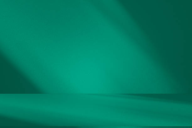istock Studio style background wall decoration presentation uses white and green tones. with shadows cast from a nearby window, concept creating a decorative 2222988131