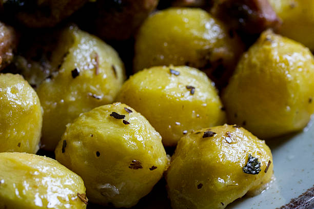 fried potatoes with meat on a plate. lifestyle, close-up. flat lay
