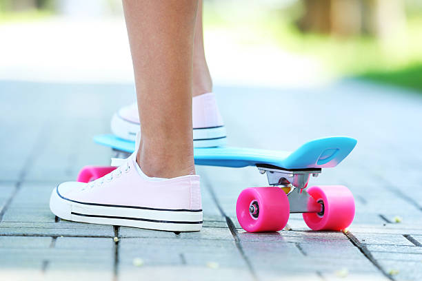 istock Girl with skateboard in the park 2222998148