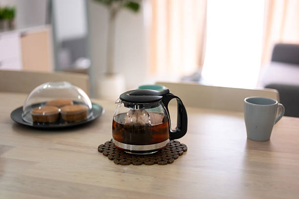 Tea and Treats on a Wooden Table