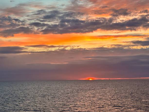 istock sunrise over the horizon 2223004132